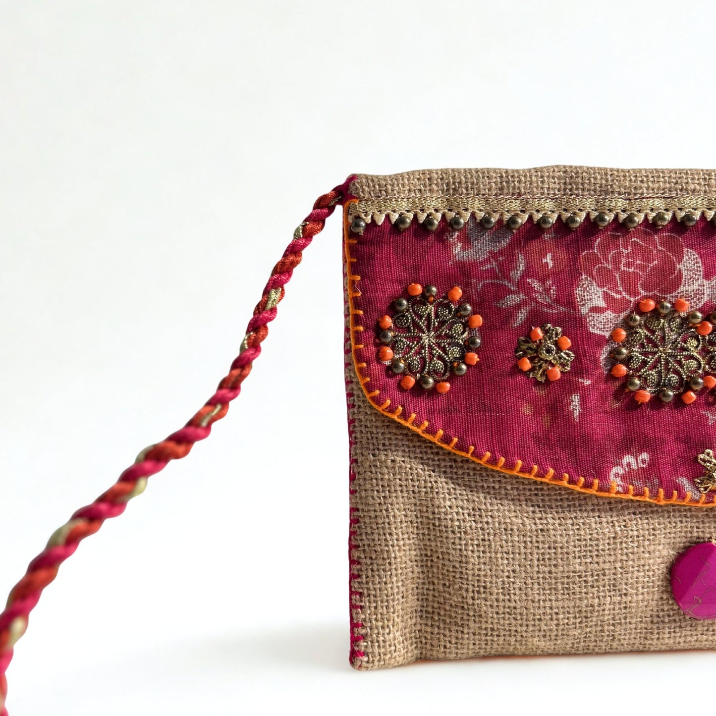 NATURAL JUTE CLUTCH BAG WITH MAROON AND ORANGE ACCENTS
