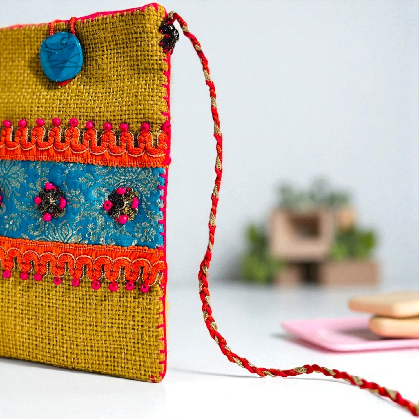 MUSTARD YELLOW JUTE PHONE BAG WITH MULTICOLOR ACCENTS